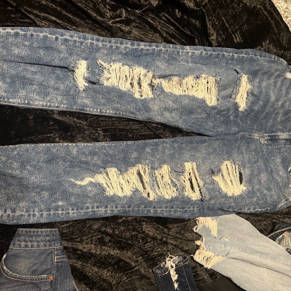 Distressed Blue Jeans